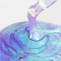 Cosmedix Opti Crystal Liquid Crystal Eye Serum in a light blue squeeze tube close up swatch