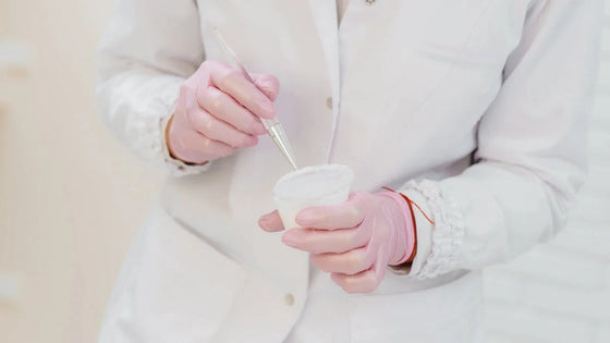 Dermatologist  mixing an occlusive moisturizer