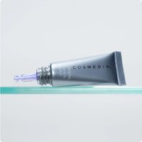 Cosmedix Opti Crystal Liquid Crystal Eye Serum in a light blue squeeze tube at skin type solutions