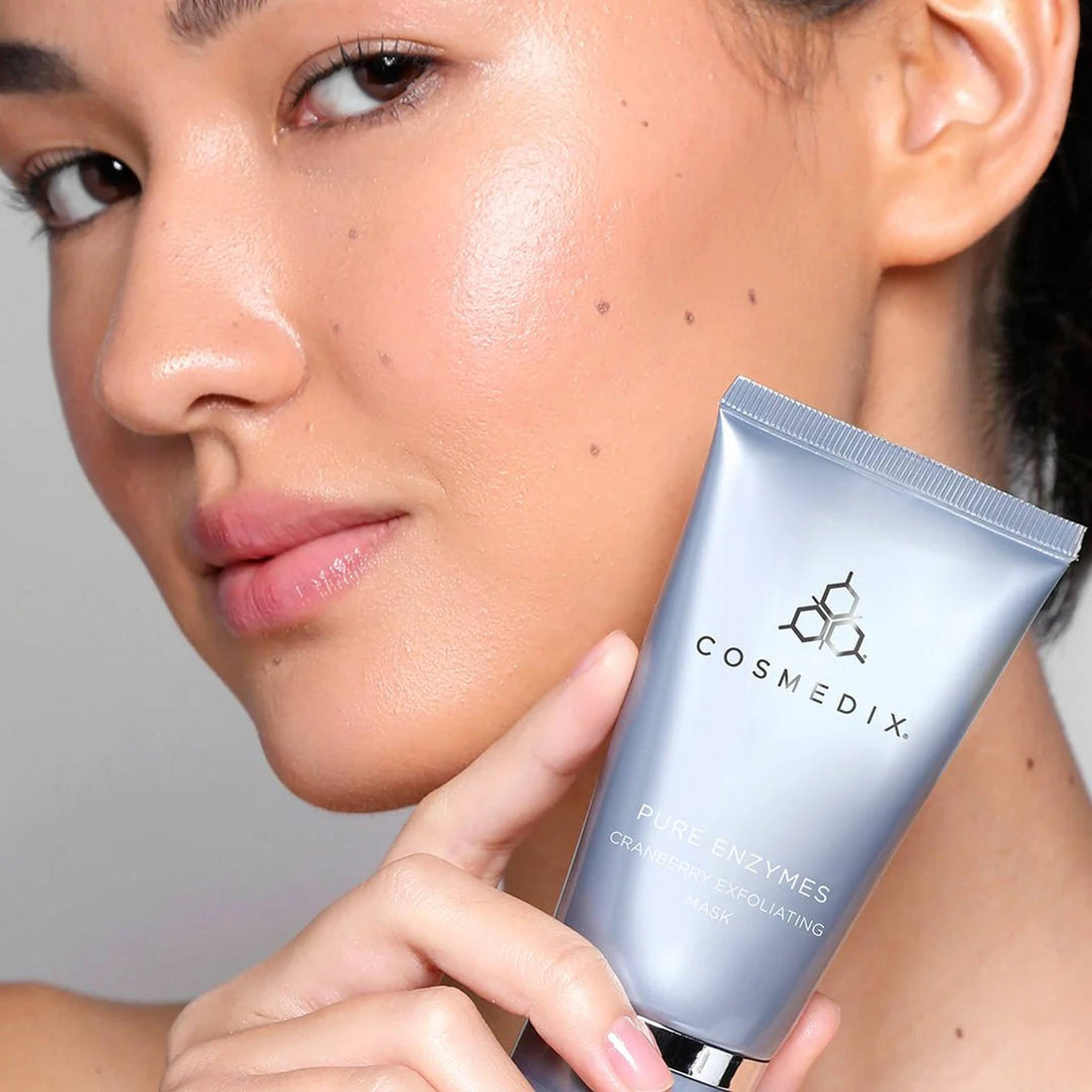 Cosmedix Pure Enzymes Exfoliating Mask with model at skin type solutions