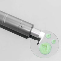 COSMEDIX Purity Clean Hydrating Cleanser in a sleek, metallic silver pump bottle with a white dispenser cap, shown against a plain white background. at skin type solutions swatch