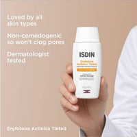 A white bottle of ISDIN Eryfotona Actinica Tinted Lightweight Emulsion Sunscreen SPF 50, skin type solutions key benefits