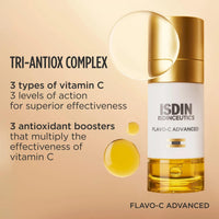 ISDIN ISDINCEUTICS FLAVO-C ADVANCED Tri-Antiox Complex serum bottle with gold and white packaging, set against a warm beige background with text and golden droplet graphics. Skin type solutions
