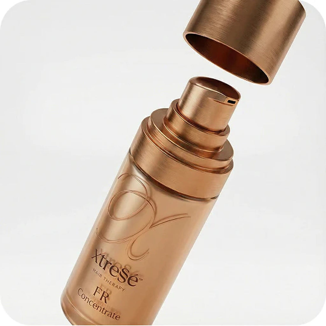 A bottle of xtreSe FR Concentrate hair therapy open cap at skin type solutions